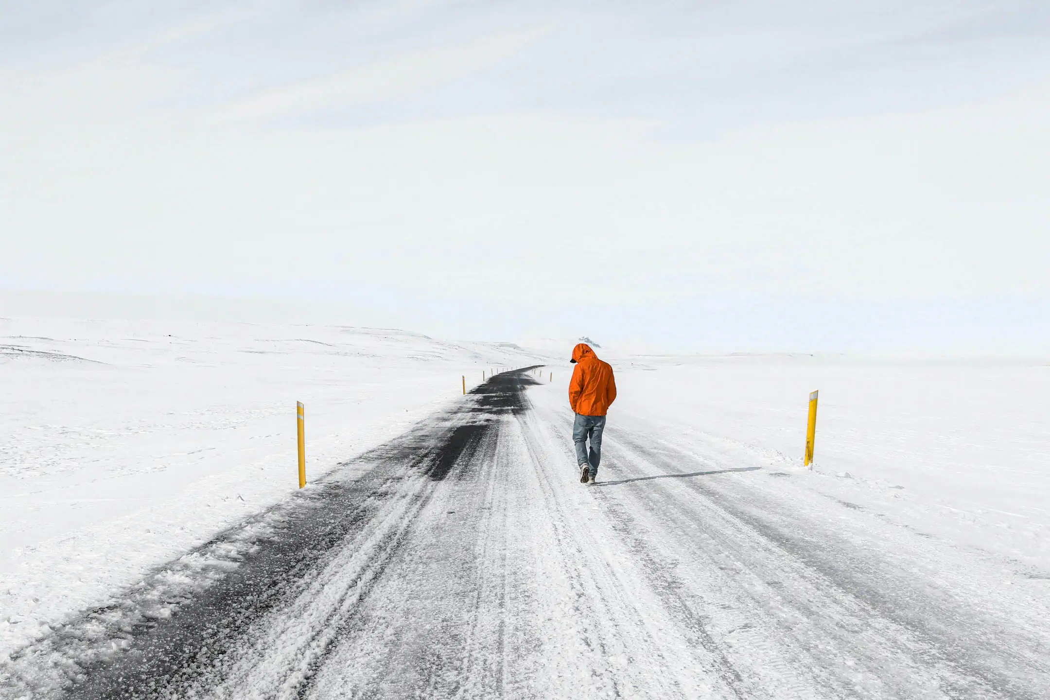 Driving a campervan on icy winter roads in Iceland in winter