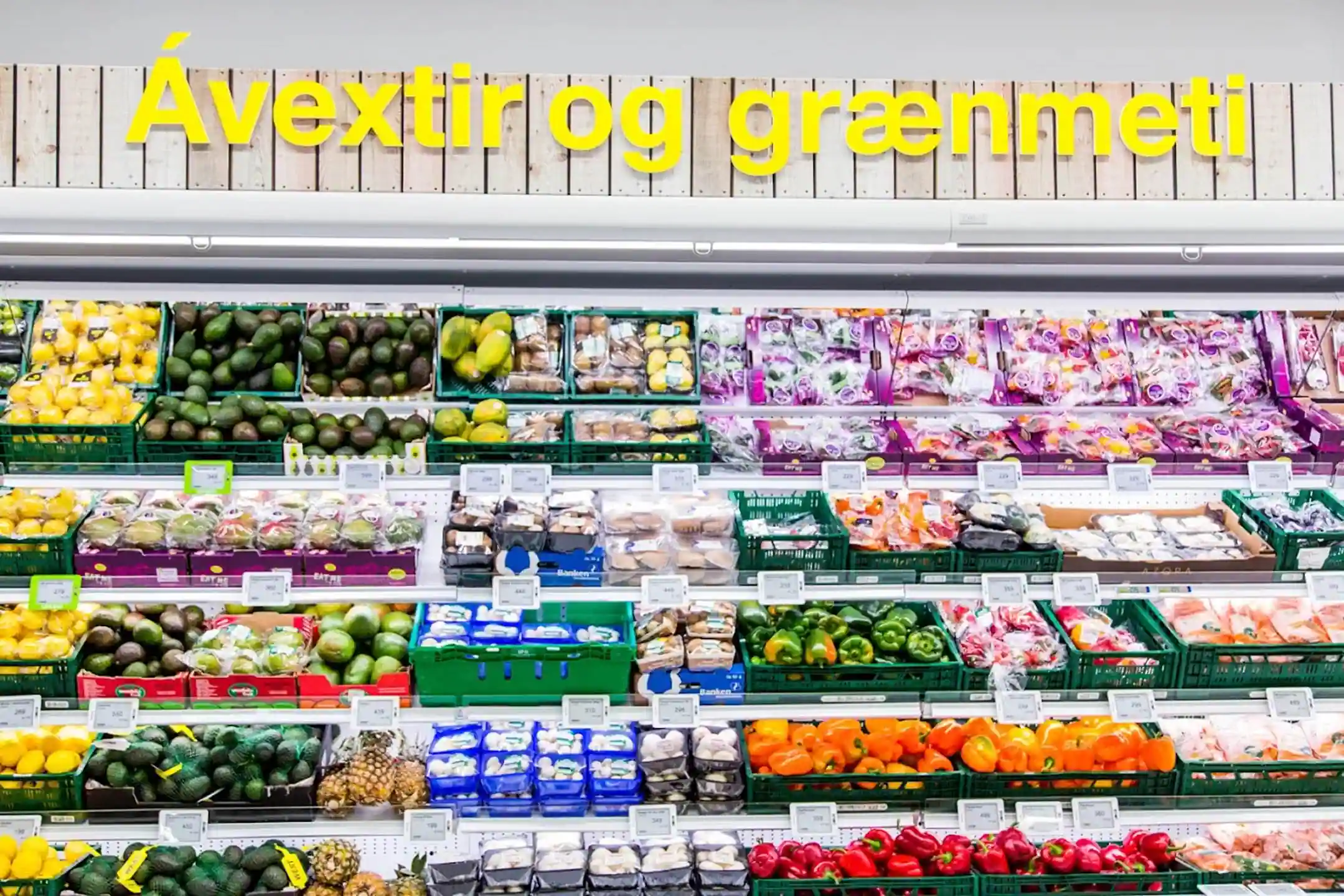 Fresh produce section in an Icelandic supermarket, similar to what travelers look for when grocery shopping in Iceland