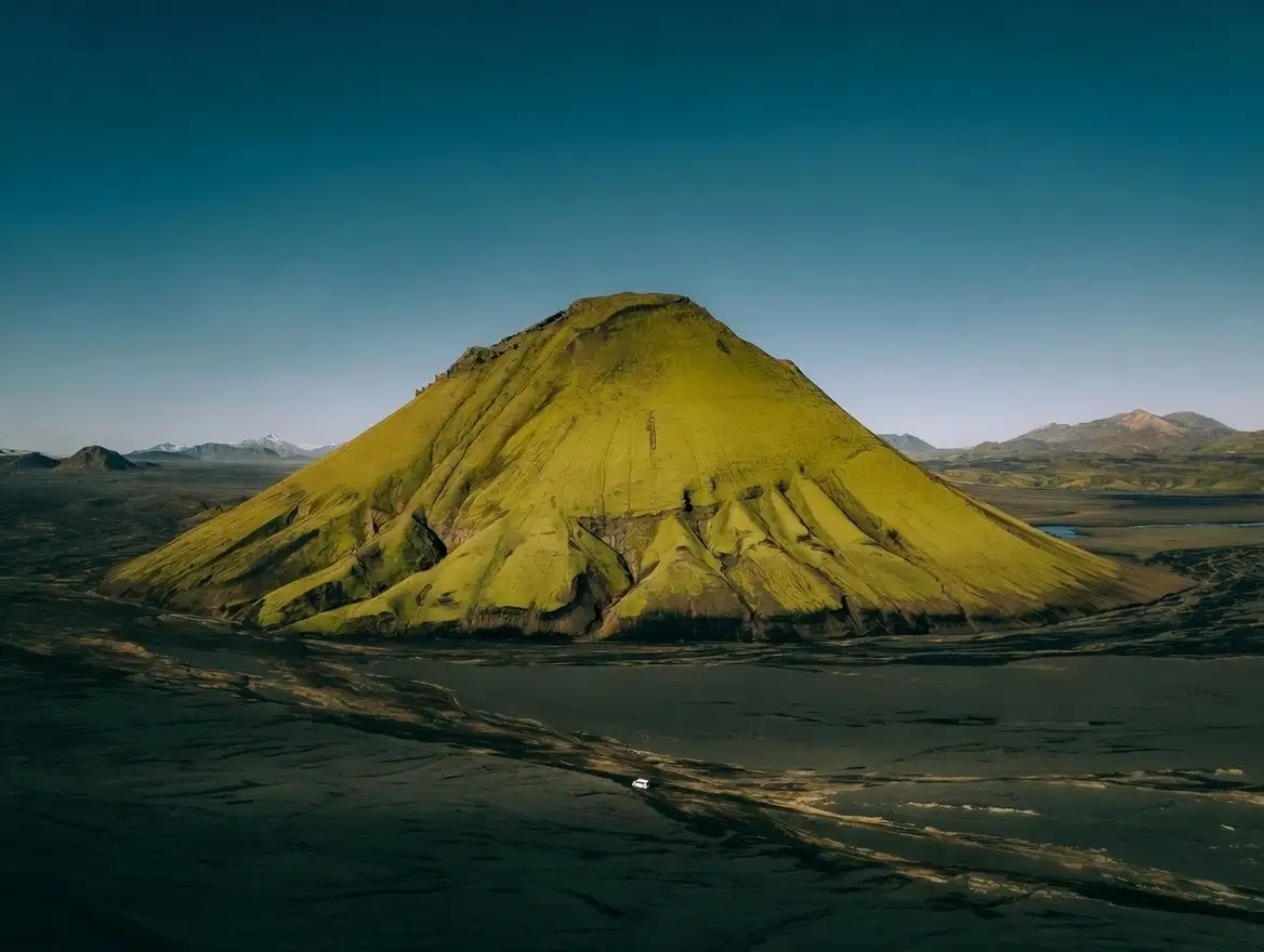 Campervan exploring Iceland’s volcanic landscape during a road trip planned with a reliable campervan rental